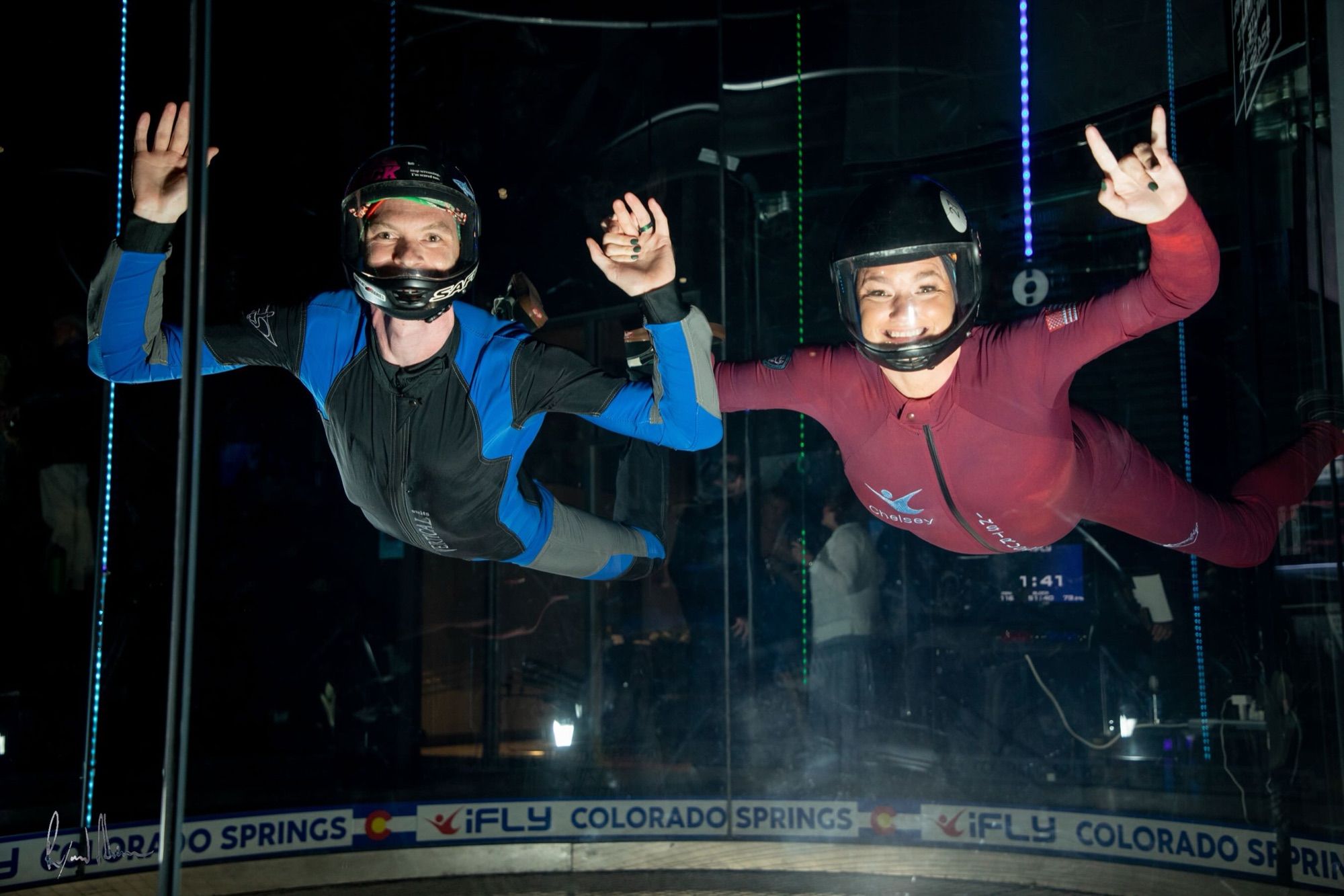 Gabriel and Chelsey flying together in the iFly tunnel on their wedding day